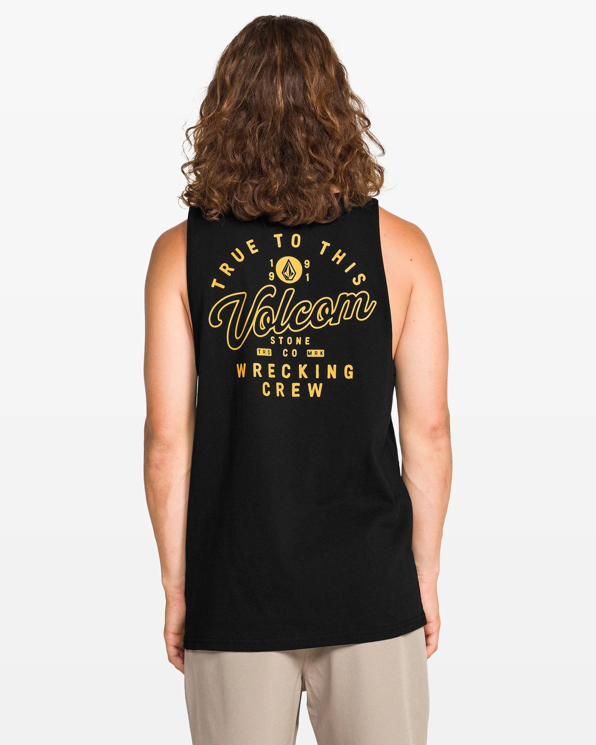 Person wearing Wrecking Tank Apparel Black Apparel, Male model wearing black sleeveless tank against neutral studio