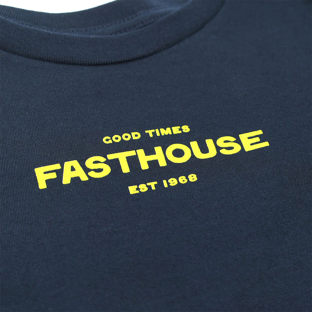 Close-up of Youth Anchor Tee Midnight Navy Kids Midnight Navy Kids Tee showing Yellow embroidered text on navy cotton
