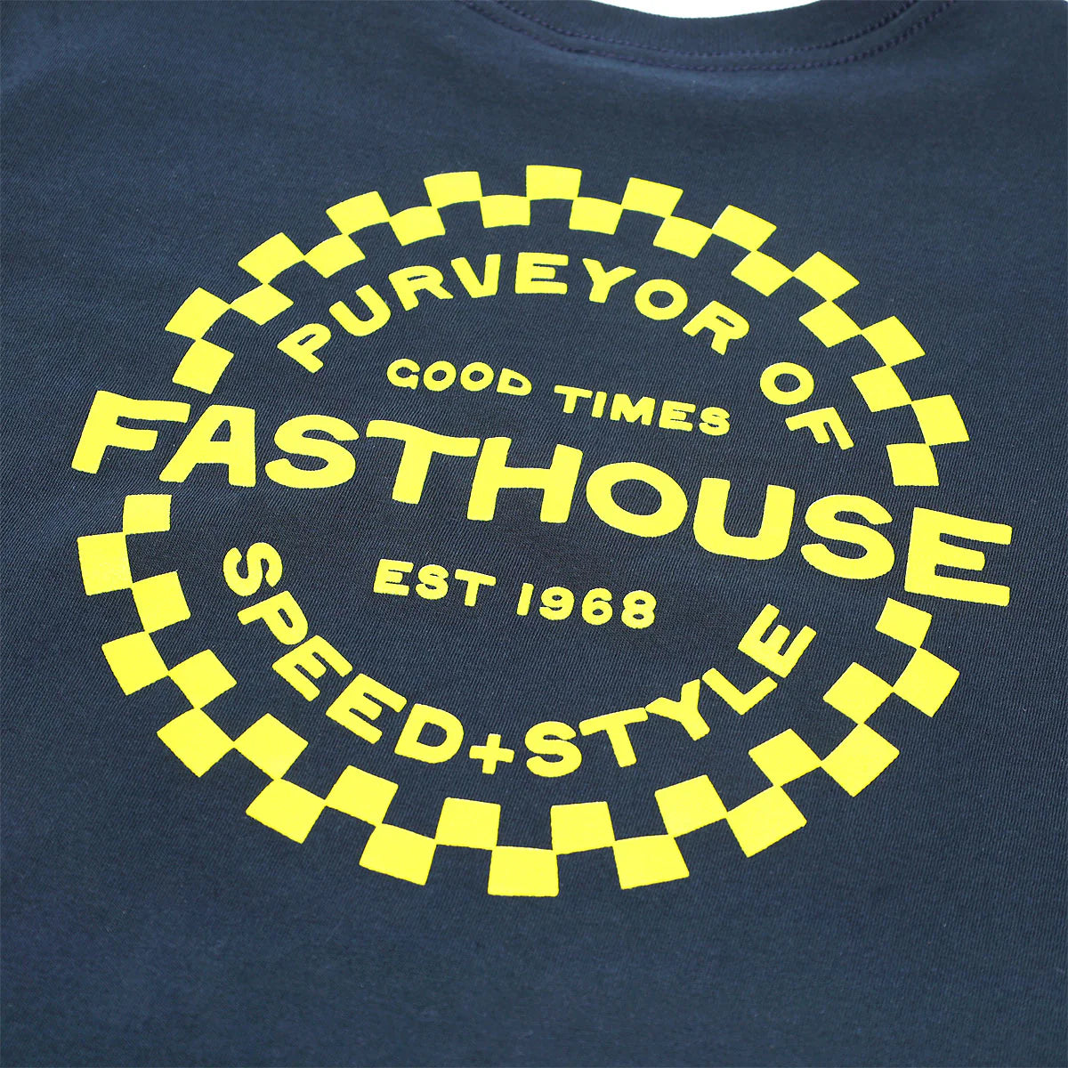Close-up of Youth Anchor Tee Midnight Navy Kids Midnight Navy Kids Tee showing Yellow checkered border with circular text