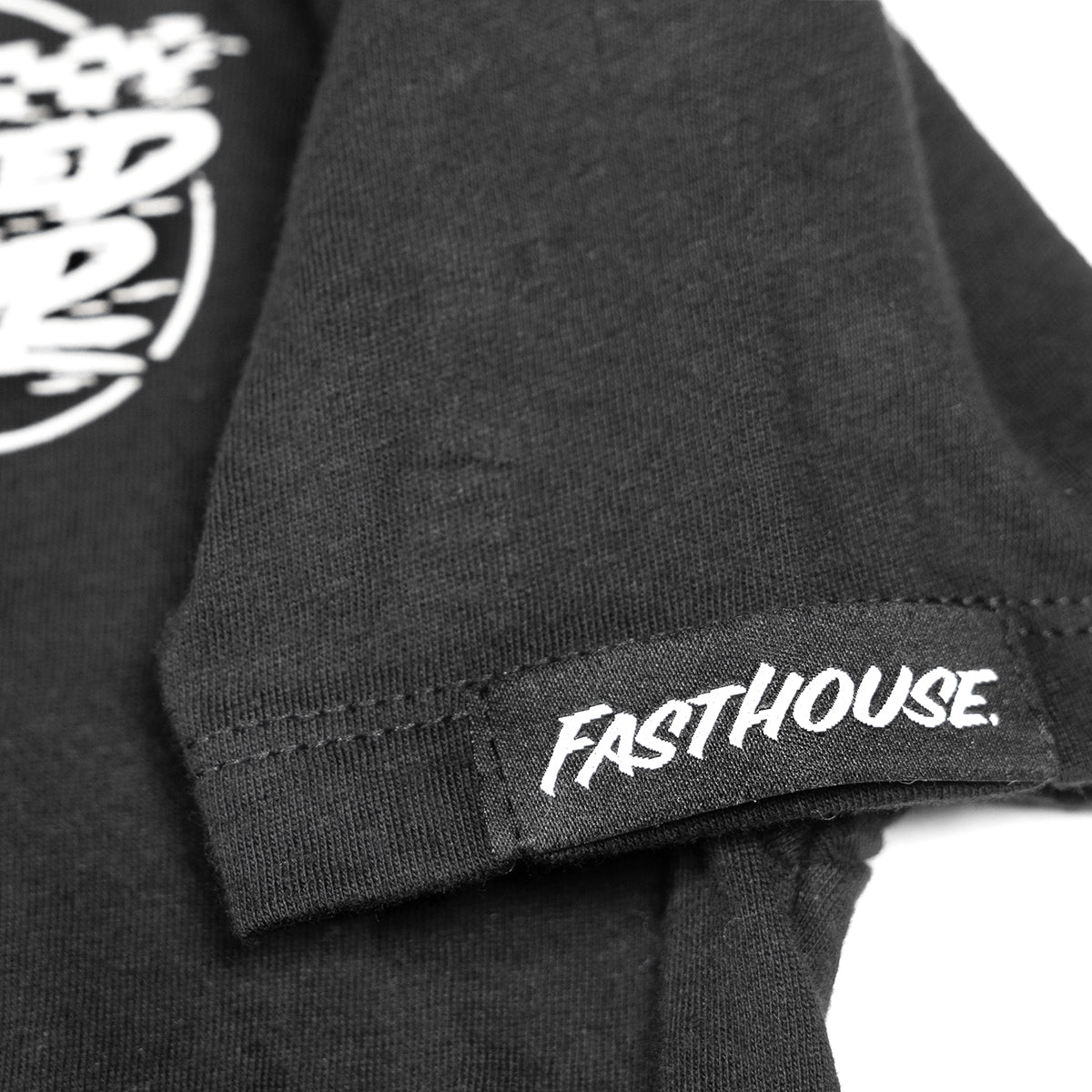 Close-up of Youth Burner Tee Kids Black Kids Tee showing Ribbed sleeve cuff with white embroidered text on black band -