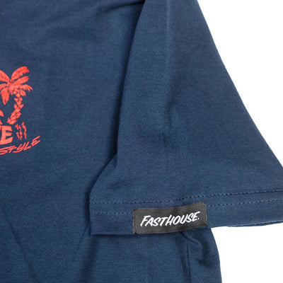 Close-up of Youth Explorer Tee Kids Midnight Navy Kids Tee showing Woven brand label on side seam with white italic text -