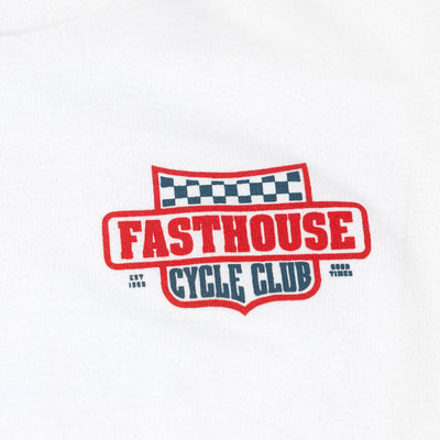 Close-up of Youth Krest Tee Kids White Kids Tee showing Red embroidered badge with checkered flag above, navy text reading