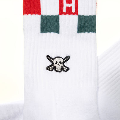 Back of Youth Riff Crew Sock Apparel Apparel, White crew sock with red and teal blocked pattern at cuff, black embroidered