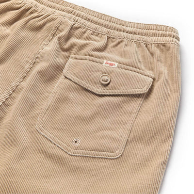 Close-up of Yuma Shorts Dark Olive Shorts showing Ribbed fabric texture with dual cargo pockets and button closures -